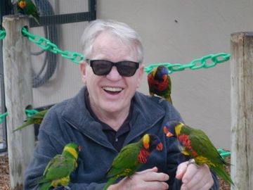 Chuck Soergel with parrots